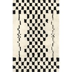 a black and white rug with squares on it