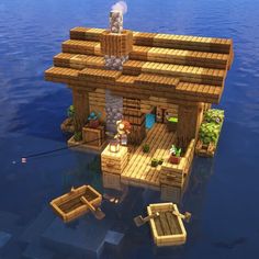 a small wooden house floating on top of water