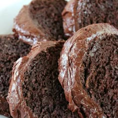 several chocolate cakes are stacked on top of each other