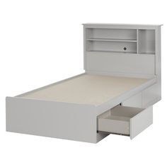 a white bed with two drawers underneath it