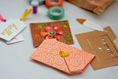 some crafting supplies are laying out on a table