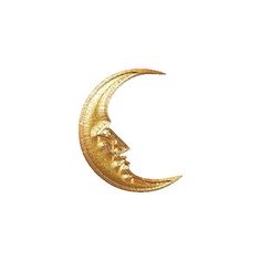 a gold crescent with a face on it