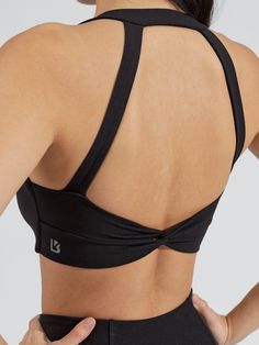 Features: Twist front detailing Back twist detailing V-neckline Halter detail Removable bust pads Details: Fabric: Butter (Nylon/Spandex) Light Support Level Description: The Twisted Sports Bra is a shortline sports bra with V-shaped neckline that’s sure to highlight all your best features. It features a front and back twist detail and a halter strap detail for a chic look. It is made with our Butter fabric for a soft, buttery feel with great flexibility. Sports Wear Fashion Illustration, Activewear Details, Pole Clothes, Sports Wear Fashion, Sports Bra Design, Double Twist, Underwire Sports Bras, Sports Wear Women, Set Outfits