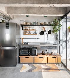 the kitchen is clean and ready to be used as a bar or coffee shop in someone's home