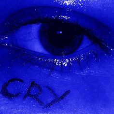 an eye with the word c & x written on it's irise blue eyes