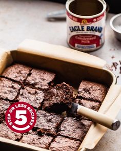 brownies in a pan with a 5 for less sticker on the side next to it