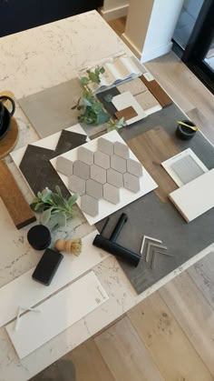 the table is covered with different types of tiles