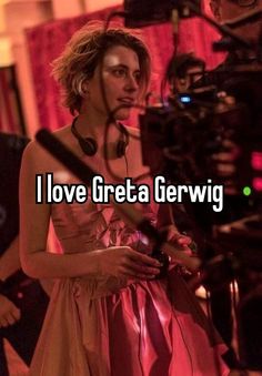 a woman standing in front of a camera with the words i love greta gerwig