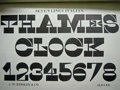 an advertisement for the james clock company with black and white type on it's side