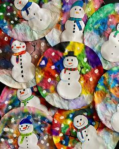 paper plates with snowmen painted on them