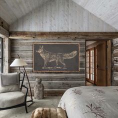 a bedroom with wood paneling and a painting on the wall above the headboard