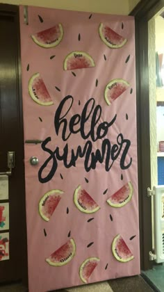 a door decorated with watermelon slices and the words hello summer