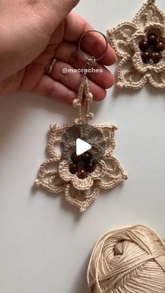 crocheted ornaments are being displayed on a table