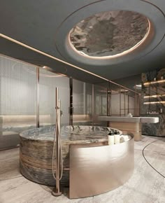 a bathroom with a circular tub and marble counter tops on the walls, along with a round shower head