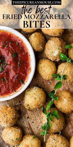 fried mozzarella bites with marinara sauce and parsley sprigs on the side