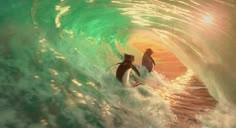 two surfers in the middle of a large wave