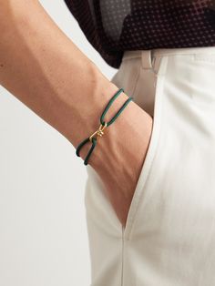 In 1998, Luis Morais decided to recreate a bracelet he'd seen in a magazine – his namesake label designs with the same DIY spirit over 20 years on. This 'Large Twisted' style is handmade from braided cord and centred by a knotted gold pendant. Wear it at the cuff of an overshirt. Gold Work, Cord Bracelet, Bracelet For Men, A Magazine, Cord Bracelets, Label Design, Bracelets For Men, Gold Pendant, 20 Years