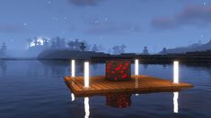 a floating platform in the middle of a body of water with red lights on it