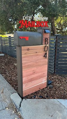 the mailbox is made out of wood and has numbers on it