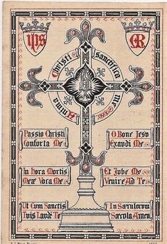 an old book with ornate designs and symbols on the front cover, including a cross