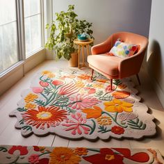 two rugs with flowers on them are next to a chair and potted plant