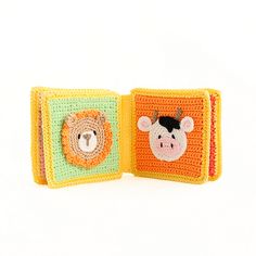 two crocheted squares with animals on them