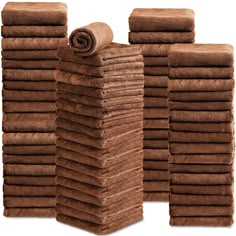 a stack of brown towels sitting next to each other