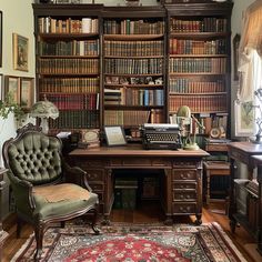 an old fashioned desk and chair in front of a bookshelf full of books