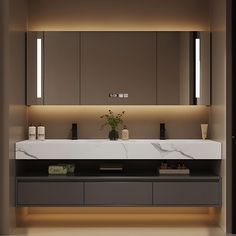 a modern bathroom with two sinks and large mirrors on the wall above it is illuminated by recessed lights