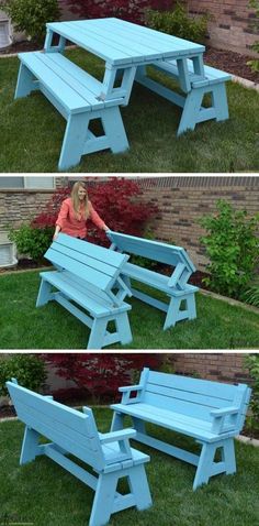 a woman sitting on top of a blue wooden bench in the middle of some grass