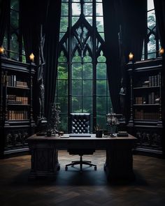 an empty desk in the middle of a room with lots of bookshelves and windows