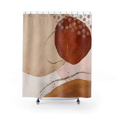 a shower curtain with an abstract design on the front and back of it, in brown tones