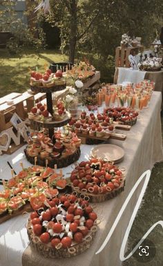 a table with many different types of food on it