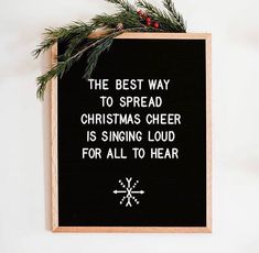 the best way to spread christmas cheer is singing loud for all to hear sign hanging on wall