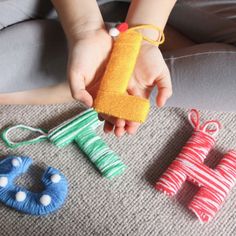 the child is playing with toys on the floor