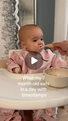 a baby sitting in a highchair eating from a spoon with the caption what my 7 month old eats in a day with timestamps