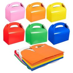 assorted colored lunch boxes with handles