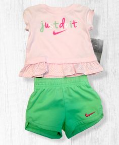 You are bidding on a Nike BABY GIRLS 2 PC SET     Sizes:   6 MONTHS  TOO CUTE!!! Short sleeve tee has snaps at back and cute ruffle Elastic waist mint green knit shorts  MSRP $30.00 GREAT DEAL!!!    This item is new with tags.  From a smoke-free home; combined shipping available.    Auction Terms & Methods of Payment   It is my desire to offer good, quality merchandise with full and accurate descriptions so that you may bid with confidence. All sales are final.  Please feel free to email me with 2000s Pink, Nike Baby, People Clothes, Infant Girls, Cute Nike, Cute Nikes, Ruffle Shirt, Baby Shorts, Pink Ruffle