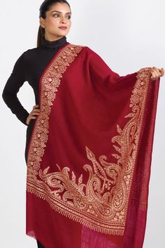 Our Geeta Embroidered Shawl features exquisite embroidery on soft 100% merino wool. With a stunning contemporary design, this classically beautiful shawl showcases the intricate embroidery traditions of Northern India in a range of jewel tones.  The high quality and elegance of our embroidered shawls make them treasures that will last for generations.  -------------------------------- Material: 100% Merino Wool Shape: Rectangle Care: Hand Wash with Gentle Detergent, Hang to Dry Dimensions: 28" x Luxury Jamawar Pashmina Shawl For Traditional Ceremonies, Luxury Semi-stitched Handloom Shawl, Luxury Handloom Traditional Drape Shawl, Luxury Elegant Embroidered Pashmina Fabric, Luxury Handmade Shawl For Gift, Luxury Traditional Shawl Scarf, Luxury Elegant Shawl With Intricate Embroidery, Luxury Dupatta Shawl With Motifs, Elegant Unstitched Shawl For Eid