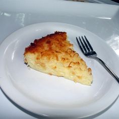 a piece of pie on a plate with a fork