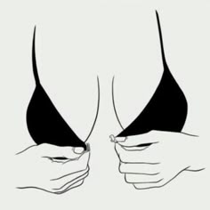 two hands holding each other over the top of their bikinis that are black and white