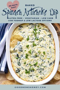 baked spinach artichoke dip in a white bowl with tortilla chips