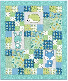 a blue and green quilt with animals on it