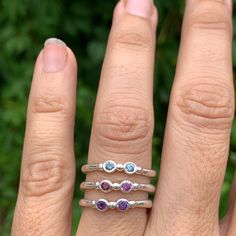 Wear them on their own or stacked all the way up your finger, our gemstone stacking bands in reclaimed sterling silver are the perfect addition to your daily jewels, a perfect gift for a loved one or yourself. Available in Ruby, Rhodolite Garnet, London Blue Topaz, Peridot, Amethyst, Blue Zircon, Spessartite Garnet, and Moonstone and mixed (pick your own stones) Each Stone measures approx 2.5mm. These beautiful pieces are handmade to order in Emily's Hudson Valley studio. Please allow 14-21 busi Stone Stacking, Stacker Rings, Spessartite Garnet, Stacking Bands, Rhodolite Garnet, Green Peridot, All The Way Up, Blue Zircon, London Blue Topaz