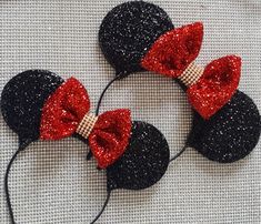 mickey mouse ears with red and black bows