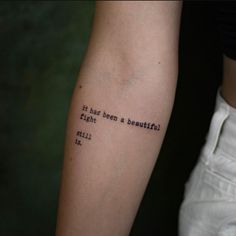 a person with a tattoo on their arm that says, it has been a beautiful night