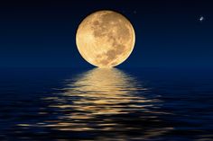 a full moon rising over the ocean with stars in the sky and water below it