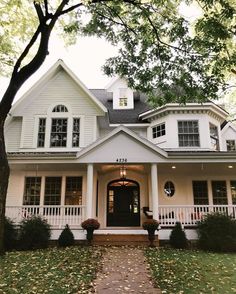 a large white house with lots of windows