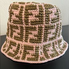 Fendi Ff Logo Hand Woven Raffia Bucket Hat Pink & Green Sz M/L Fendi Bicolour Bucket Hat Crafted In Hand-Woven Raffia And Cotton With All-Over Ff Motif. Unlined. Rare Color Combo No Longer Available In Stores. Happy To Answer Any Questions In The Comments! Fendi Crochet Hat, Designer Beach Hats For Spring, Raffia Bucket Hat, Fendi Hat, Logo Hand, Fendi Vintage, Fendi Accessories, Ff Logo, Fendi Logo