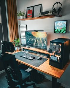 a computer desk with two monitors and a keyboard